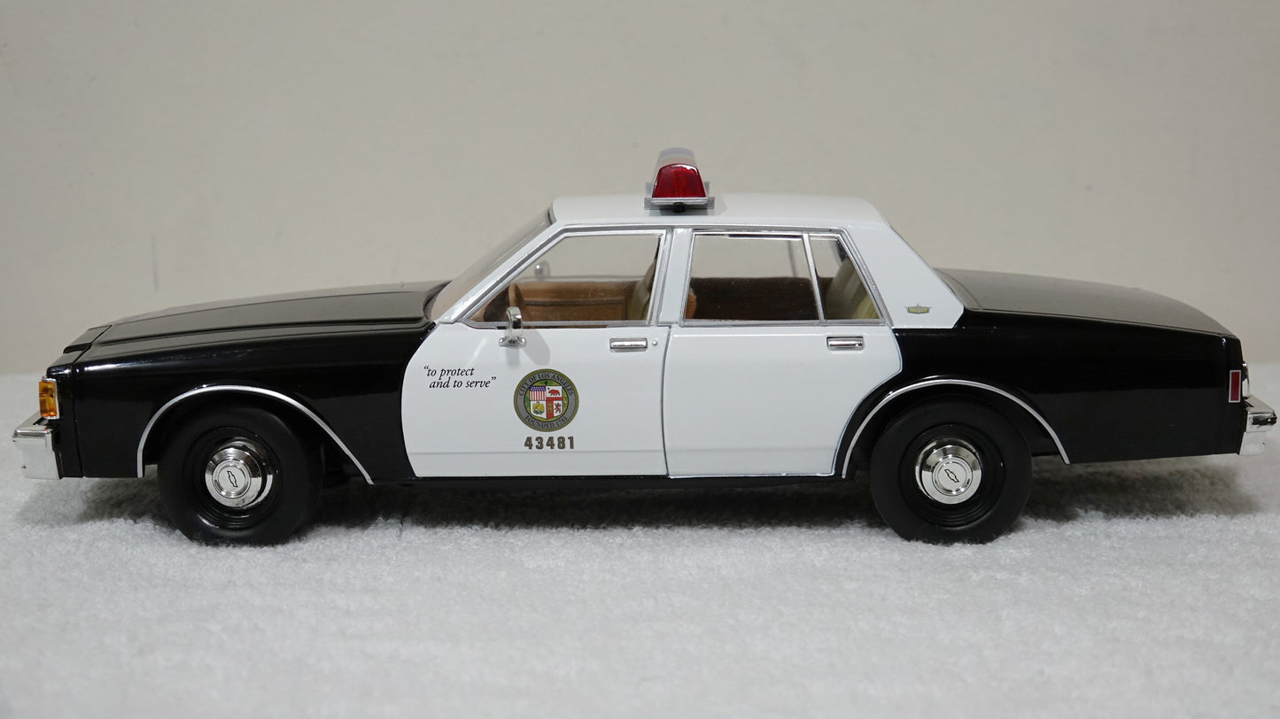 1/18 scale MacGiver Show LAPD 1986 Chevrolet Caprice with custom added lights and siren. FREE SHIPPING