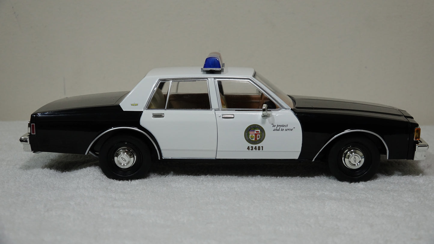 1/18 scale MacGiver Show LAPD 1986 Chevrolet Caprice with custom added lights and siren. FREE SHIPPING